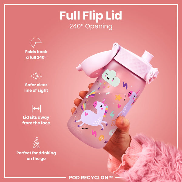 A pink children's water bottle, featuring a unicorn design, is being held; its full flip lid provides a 240° opening. The bottle is shown against a pink background. The text reads: “Full Flip Lid 240° Opening,” “Folds back a full 240°,” “Safer clear line of sight,” “Lid sits away from the face,” “Perfect for drinking on the go,” and “POD RECYCLON™.”