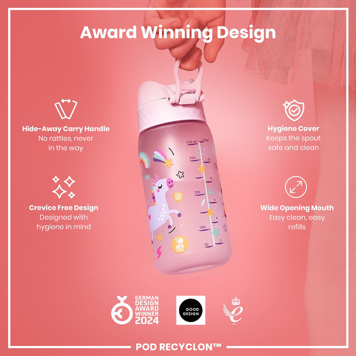 A pink children's water bottle, decorated with a unicorn, is being held. It features a hide-away handle, hygiene cover, and wide mouth for easy cleaning. The bottle is BPA free and a 2024 German Design Award winner.