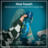 A dark-blue water bottle, featuring a dinosaur design, is held; its flip top opens one-handed. The bottle is described as having triple lock security and is leak-proof. The context is a person wearing a checkered sweater and teal socks.