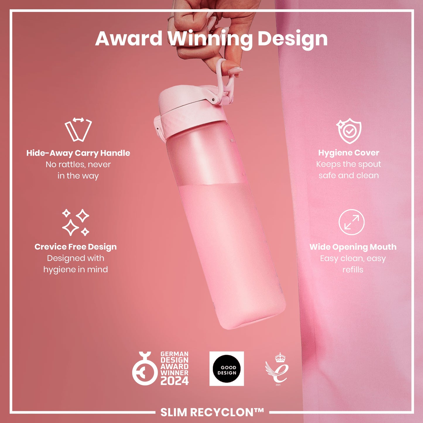 A pink water bottle is being held; it features a hide-away handle, hygiene cover, and wide mouth. The bottle is award-winning, designed for hygiene, and easy to clean and refill. GERMAN DESIGN AWARD WINNER 2024, GOOD DESIGN, and 2021 logos are present.
