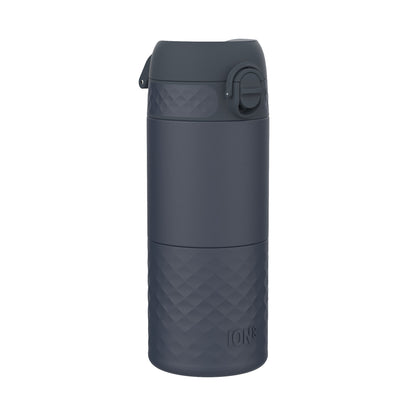 A dark-gray ION8 water bottle stands upright against a white background. Its textured base and lid feature a geometric pattern.