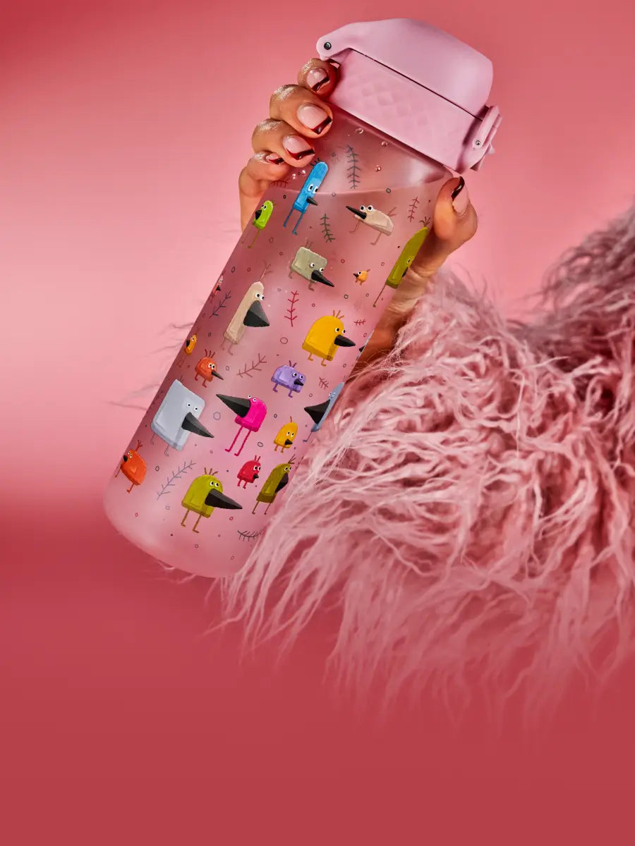 water bottle made from recyclon in pink being held by a women in a fluffy coat